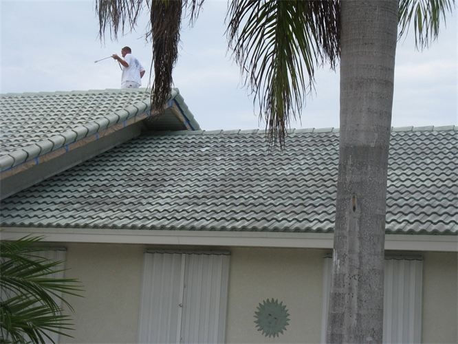 Exterior roof painting in progress